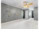 Spacious bedroom features neutral carpet, decorative ceiling fan and closet door at 11126 Windgate Ct, Tega Cay, SC 29708