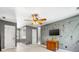 Spacious bedroom features neutral carpet, decorative ceiling fan and entry to bathroom at 11126 Windgate Ct, Tega Cay, SC 29708