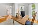 Bright office space featuring hardwood floors, white walls, and a wooden desk with modern computer setup at 11126 Windgate Ct, Tega Cay, SC 29708