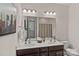 Bathroom with a double sink vanity and a large mirror at 1209 Shelly Woods Dr, Indian Land, SC 29707