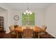 Bright dining room with hardwood floors, decorative accents, and natural light at 1209 Shelly Woods Dr, Indian Land, SC 29707