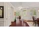 Elegant foyer with hardwood floors, decorative molding, and bright natural light at 1209 Shelly Woods Dr, Indian Land, SC 29707