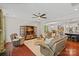 Cozy living room featuring leather furniture, soft rug, ceiling fan, and open layout at 1209 Shelly Woods Dr, Indian Land, SC 29707