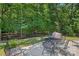 Relaxing patio area with comfortable seating and wooded views at 1209 Shelly Woods Dr, Indian Land, SC 29707