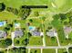 Aerial shot of a property highlighting its generous lot size, in-ground pool, and proximity to a golf course at 132 Broadbill Dr, Mooresville, NC 28117