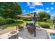 Backyard featuring a gazebo, a fire pit, and comfortable seating, creating an inviting outdoor space at 132 Broadbill Dr, Mooresville, NC 28117