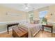 Inviting bedroom with lots of natural light, neutral tones, and views of the yard at 132 Broadbill Dr, Mooresville, NC 28117
