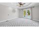 Spacious bedroom features a ceiling fan and direct access to the pool area through elegant French doors at 132 Broadbill Dr, Mooresville, NC 28117