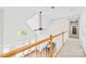 Bright hallway with beautiful railing, light-colored walls, natural light, and clear views of the downstairs area at 132 Broadbill Dr, Mooresville, NC 28117