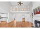 Spacious living room with hardwood floors, a loft area, and easy access to other living spaces at 132 Broadbill Dr, Mooresville, NC 28117