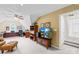 Comfortable home office featuring dual workstations, plush seating, and soft natural light from a window at 132 Broadbill Dr, Mooresville, NC 28117