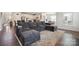 Spacious living room connected to the kitchen and dining areas, perfect for entertaining at 13339 Mcguffy Dr, Huntersville, NC 28078