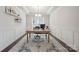Dedicated home office featuring wainscoting, a large window, and neutral decor at 13339 Mcguffy Dr, Huntersville, NC 28078