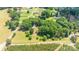 An aerial view of a home surrounded by mature trees on a spacious lot at 155 Mcallister Rd, Statesville, NC 28625