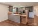 Modern kitchen with stainless steel appliances, wood countertops, gray cabinets and an attached breakfast bar at 155 Mcallister Rd, Statesville, NC 28625