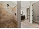 Bathroom features a sleek glass-enclosed shower, modern fixtures, and tile walls, creating a luxurious space at 1687 Sierra Rd, York, SC 29745