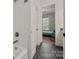 Bright bathroom showcasing a tub and access to the en-suite bedroom at 1687 Sierra Rd, York, SC 29745