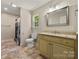 Bathroom features granite countertops, tile flooring, and a tiled shower at 1687 Sierra Rd, York, SC 29745