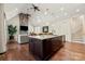 Spacious kitchen with a large island, granite countertops, stainless steel appliances, and an open floor plan at 1687 Sierra Rd, York, SC 29745