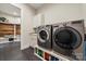 Functional laundry room with modern appliances and custom storage solutions at 1687 Sierra Rd, York, SC 29745