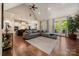 Spacious living room with cathedral ceiling has an open floor plan, access to deck, and adjoins the kitchen at 1687 Sierra Rd, York, SC 29745
