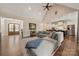Open concept living room seamlessly connects the kitchen, dining area, and entryway, great for entertaining at 1687 Sierra Rd, York, SC 29745