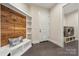 Inviting mudroom with custom bench, shelves and convenient access to laundry at 1687 Sierra Rd, York, SC 29745