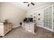 The home's office features custom bookshelves, neutral carpet, and a workspace with natural light at 1687 Sierra Rd, York, SC 29745