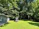 Well maintained backyard with a storage shed at 201 Barnes Ln, Stony Point, NC 28678