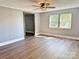 Bright living room featuring hardwood floors, neutral paint, and natural light at 201 Barnes Ln, Stony Point, NC 28678