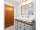 Modern bathroom featuring dual sinks, a large mirror, and sleek fixtures at 2028 Old Latter Rd, Newton, NC 28658