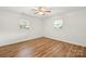 Bright bedroom with hardwood floors and windows offering natural light at 2028 Old Latter Rd, Newton, NC 28658