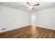 Spacious bedroom with hardwood floors, natural light, and neutral decor at 2028 Old Latter Rd, Newton, NC 28658
