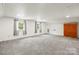 Large bonus room with carpet, two windows, and neutral decor at 2028 Old Latter Rd, Newton, NC 28658