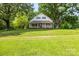 Charming two-story home with a welcoming front porch and a large, well-maintained front yard at 2028 Old Latter Rd, Newton, NC 28658