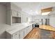 Bright kitchen with white cabinets, stainless steel appliances, and butcher block island offers ample counter space at 2028 Old Latter Rd, Newton, NC 28658