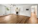 Open concept living room featuring a fireplace, built in shelving, and wood look flooring at 2028 Old Latter Rd, Newton, NC 28658