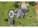 Aerial view of home featuring an in-ground pool, patio area, and manicured lawn at 2145 Jack Wilson Rd, Shelby, NC 28150