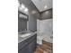 Modern bathroom featuring granite countertops, a sleek vanity, and a walk-in shower with contemporary fixtures at 2145 Jack Wilson Rd, Shelby, NC 28150