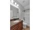 Bathroom featuring vanity sink, toilet, and shower tub with bronze fixtures at 2145 Jack Wilson Rd, Shelby, NC 28150