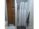 Bathroom featuring shower with white curtain and wooden cabinet at 2261 Felly Ln, Lancaster, SC 29720