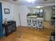 Cozy living room showcasing hardwood floors, an eat-in kitchen, and providing a comfortable living space at 2261 Felly Ln, Lancaster, SC 29720
