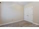 Neutral bedroom features carpet, a closet, and bright lighting at 2785 Clover Nw Rd, Concord, NC 28027