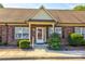 Charming brick condo with a well-manicured lawn and decorative shutters at 2785 Clover Nw Rd, Concord, NC 28027