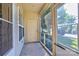 Enclosed back porch featuring natural light and outdoor access at 2785 Clover Nw Rd, Concord, NC 28027