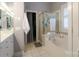 This bathroom features a soaking tub, separate shower, and large vanity with excellent storage at 406 Spyglass Hill Pl, Salisbury, NC 28144