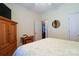 This bedroom provides a comfortable retreat with wood floors, ample storage space and natural light at 406 Spyglass Hill Pl, Salisbury, NC 28144