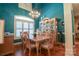 Dining room with chandelier, hardwood floor, and natural light at 406 Spyglass Hill Pl, Salisbury, NC 28144
