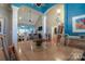 Dining room leading into living room with vaulted ceiling and hardwood floor at 406 Spyglass Hill Pl, Salisbury, NC 28144