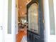 Welcoming entryway featuring a decorative glass door, high ceilings, and seamless access to the living area at 406 Spyglass Hill Pl, Salisbury, NC 28144